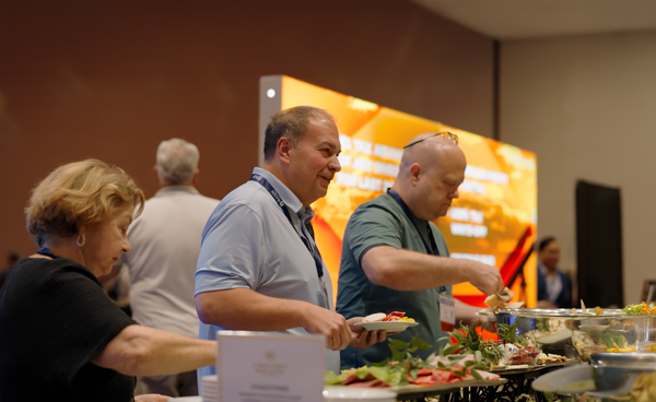 Attendees getting food