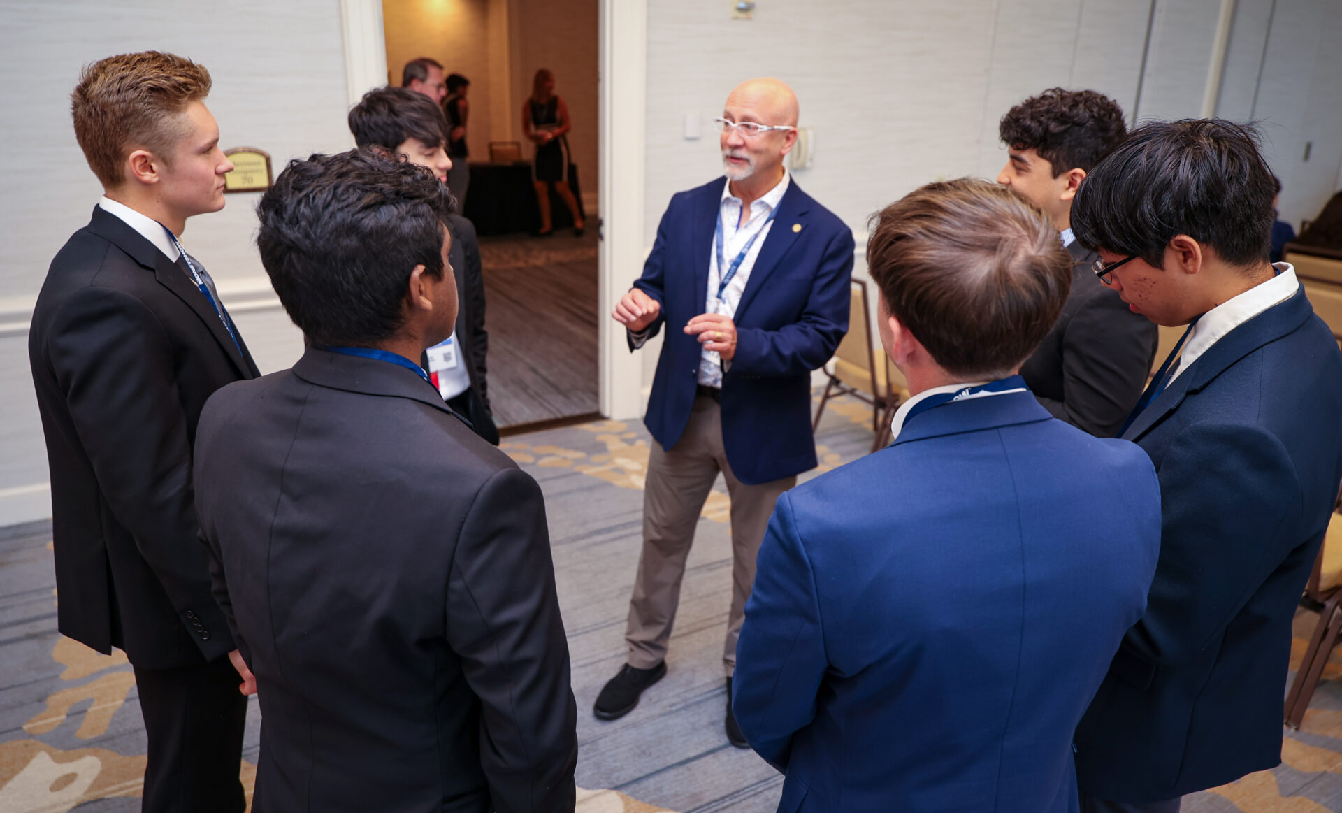 Group of Attendees asking expert questions